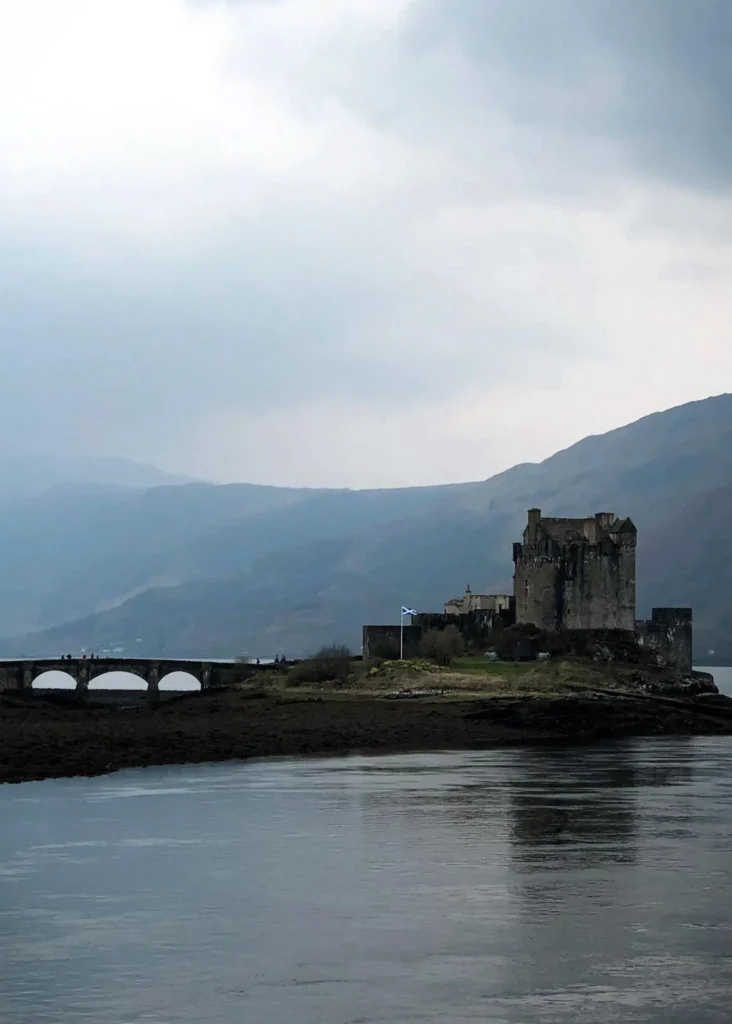 Moody, cloudy skye over Eilean Donan Castle in Scotland.