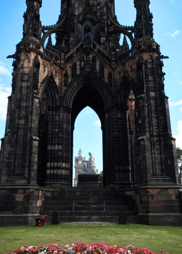 Side view of Scott Mounment in Prince Street Gardens in Edinburgh.