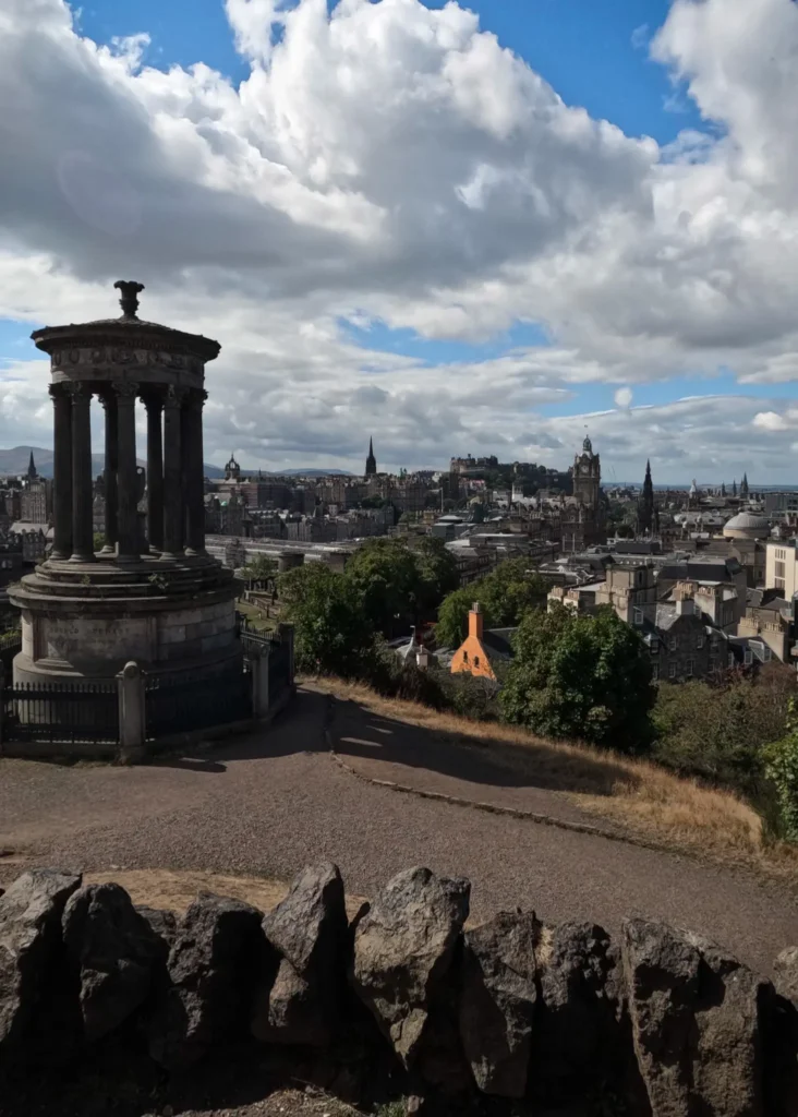 Viewpoint over Edinburgh from Calton Hill on a sunny and cloudy day.