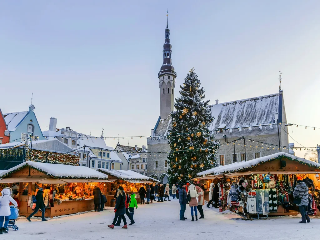 Snowy Christmas markets in the town hall square in Tallinn.