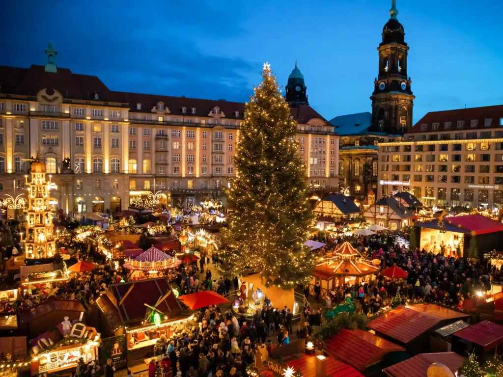 Christmas market in Striezelmarkt in Dresden, Germany, at night.
