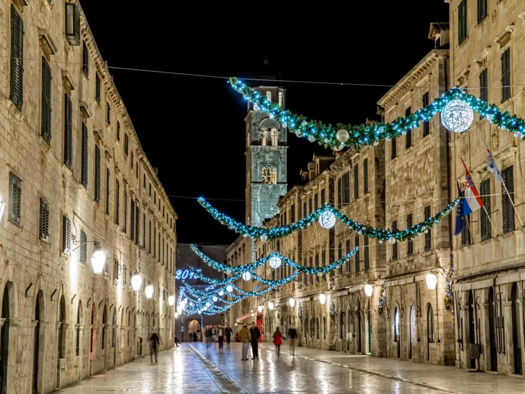 Stradun old street decorated with Christmas lights and ornaments in Dubrovnik.