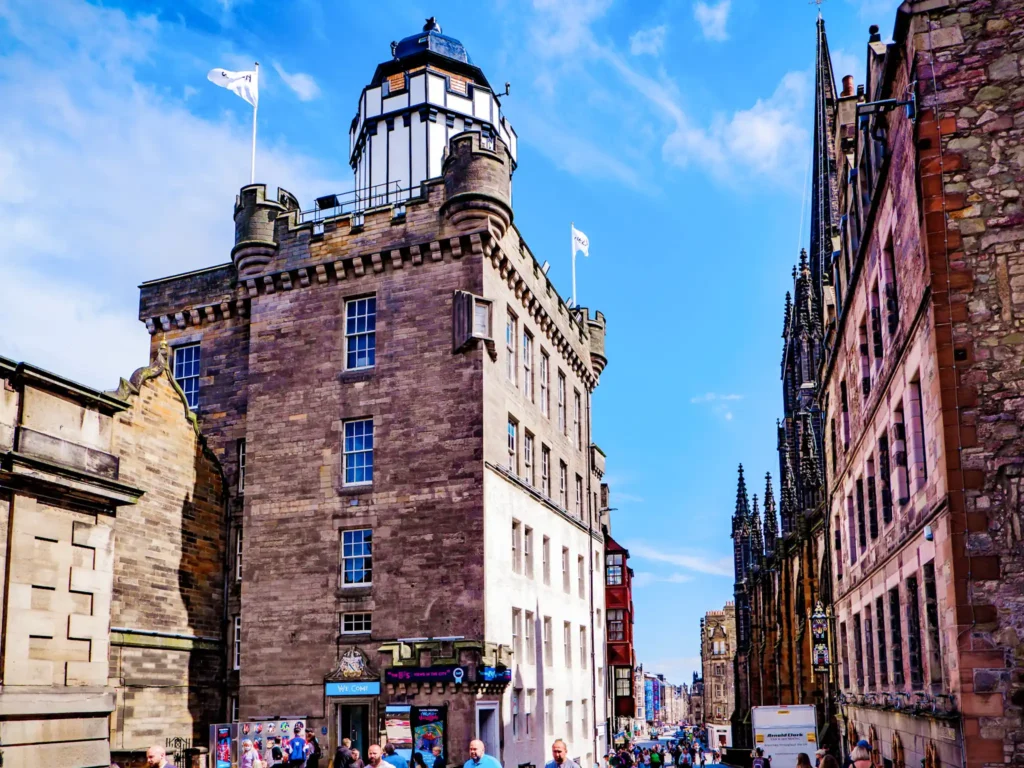 Exterior of the Camera Obscura building in Edinburgh on a sunny day.