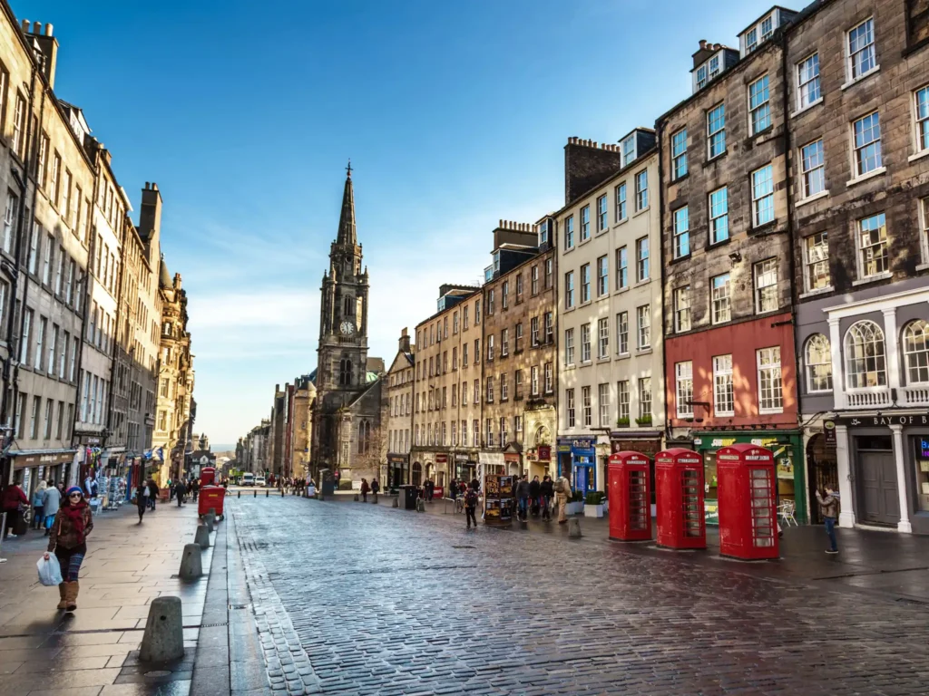 Tourists exploring the old town and royal mile in Edinburgh