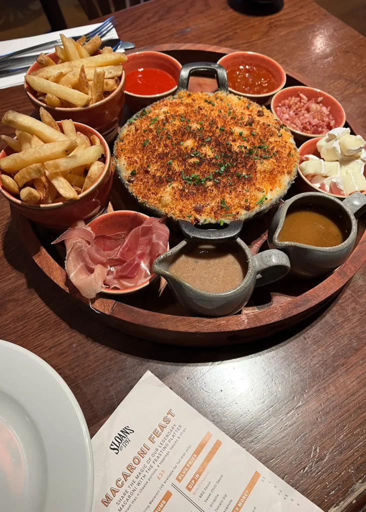 Mac and cheese sharing feast at Sloans in Glasgow with chips and dips.