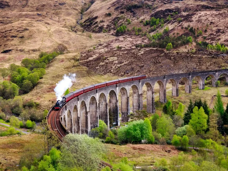 Harry Potter train going over the Glenfinnan railway viaduct near Fort William.