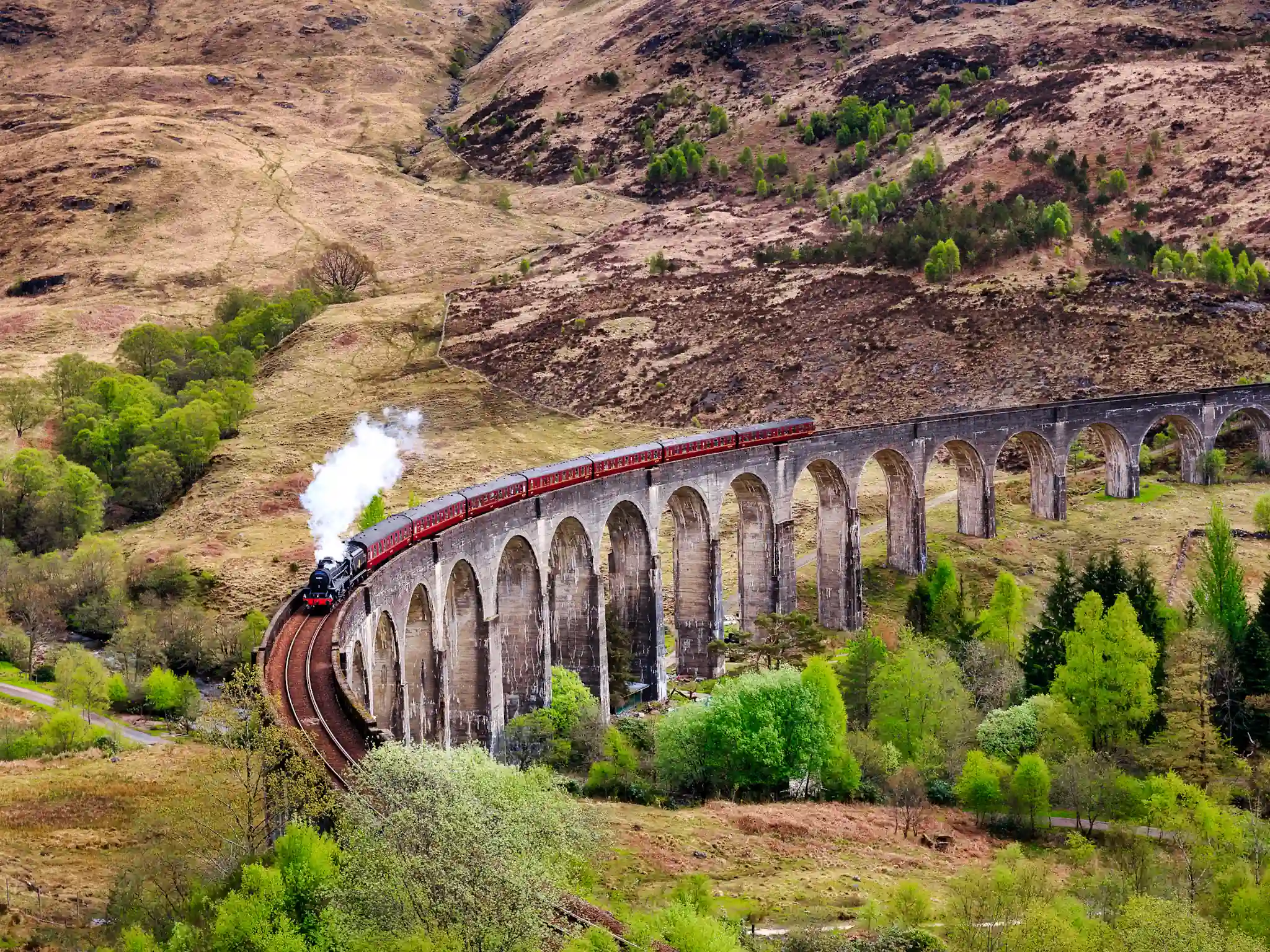 Harry Potter train going over the Glenfinnan railway viaduct near Fort William.