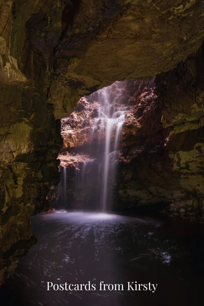Pinterest Pin showing the waterfall in Smoo Cave in Durness with "Postcards from Kirsty" text.
