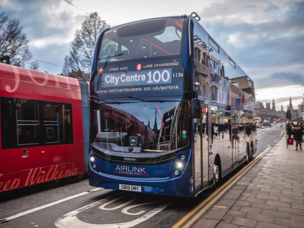 Airlink double decker 100 bus on princes street in edinburgh city.