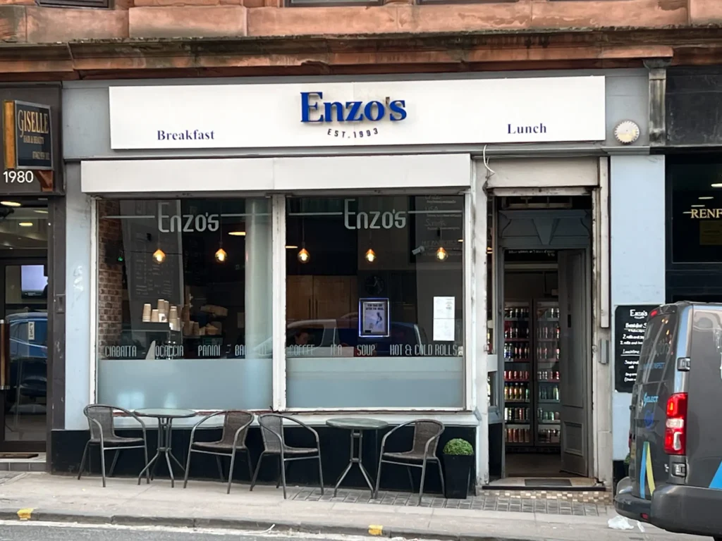 Facade of Enzo's in Glasgow City Centre showing the sign and outdoor seating.