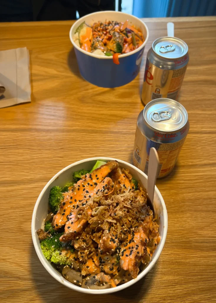 Two poke bowls and fizzy drinks at Akiko in Glasgow city centre.