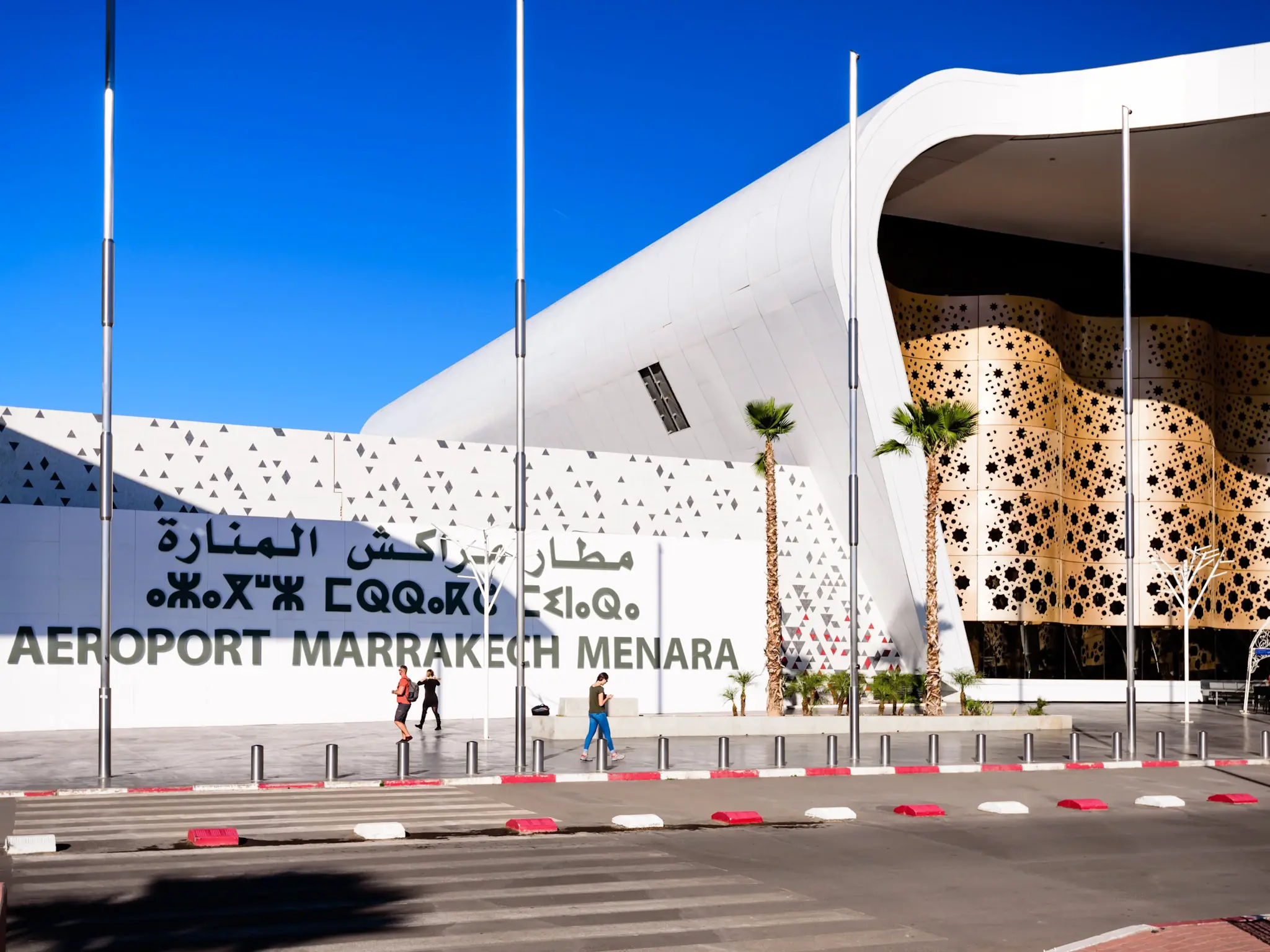 The exterior of the Marrakech Menara Airport on a sunny day.