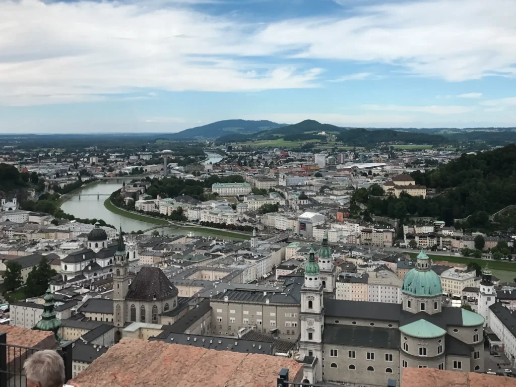 View over Salzburg from hohensalzburg fortress on a cloudy but sunny day.