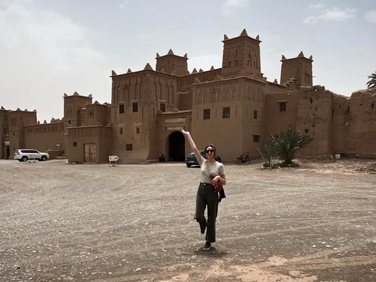Girl standing in front of Kasbah Amridil near Skrouda.