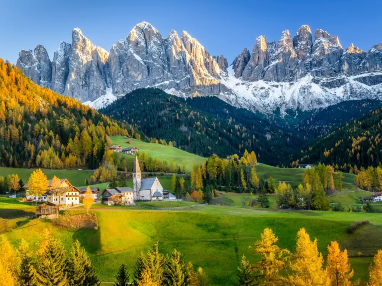 Beautiful mountain village in the Dolomites at sunset