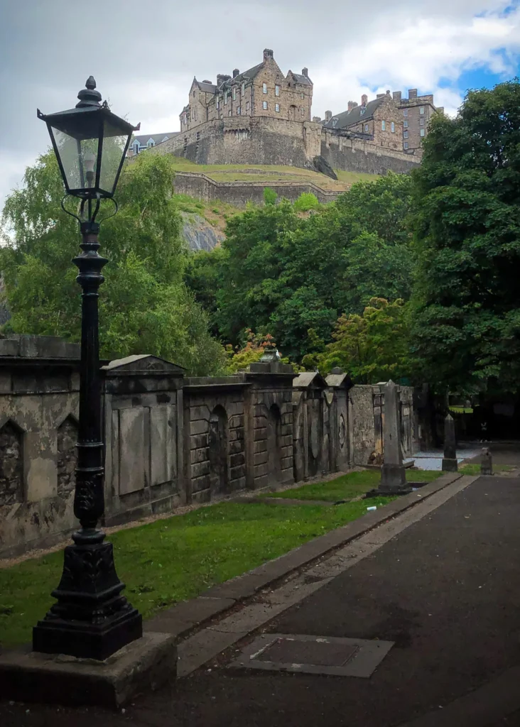 Edinburgh castle as seen from the st cuthbert's graveyard on a cloudy day