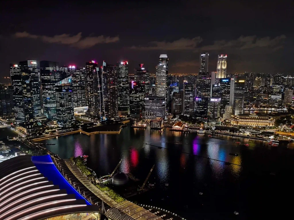 View of Singapore's financial district from Ce La Vi rooftop bar at night.