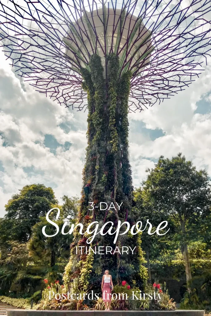Pinterest Pin showing Gardens by the Bay with a woman standing at the base looking up at them with text over the top reading "3-Day Singapore Itinerary" and "Postcards from Kirsty"