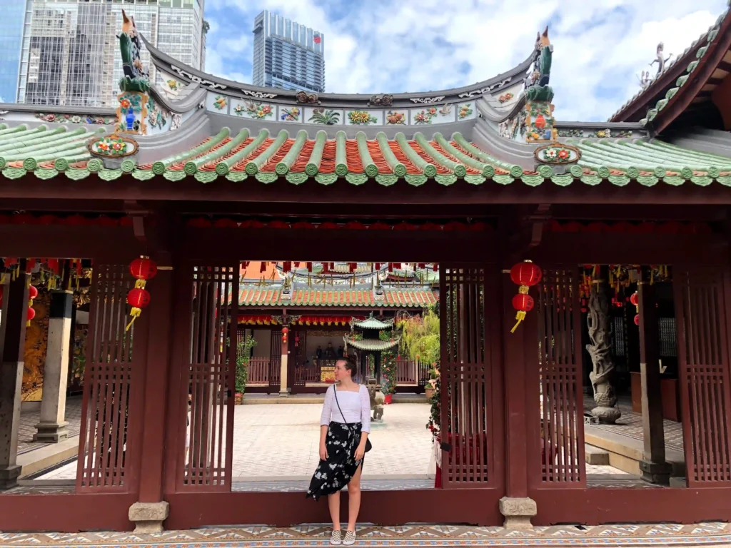Women standing in front of Thian Hock Keng Temple Singapore.