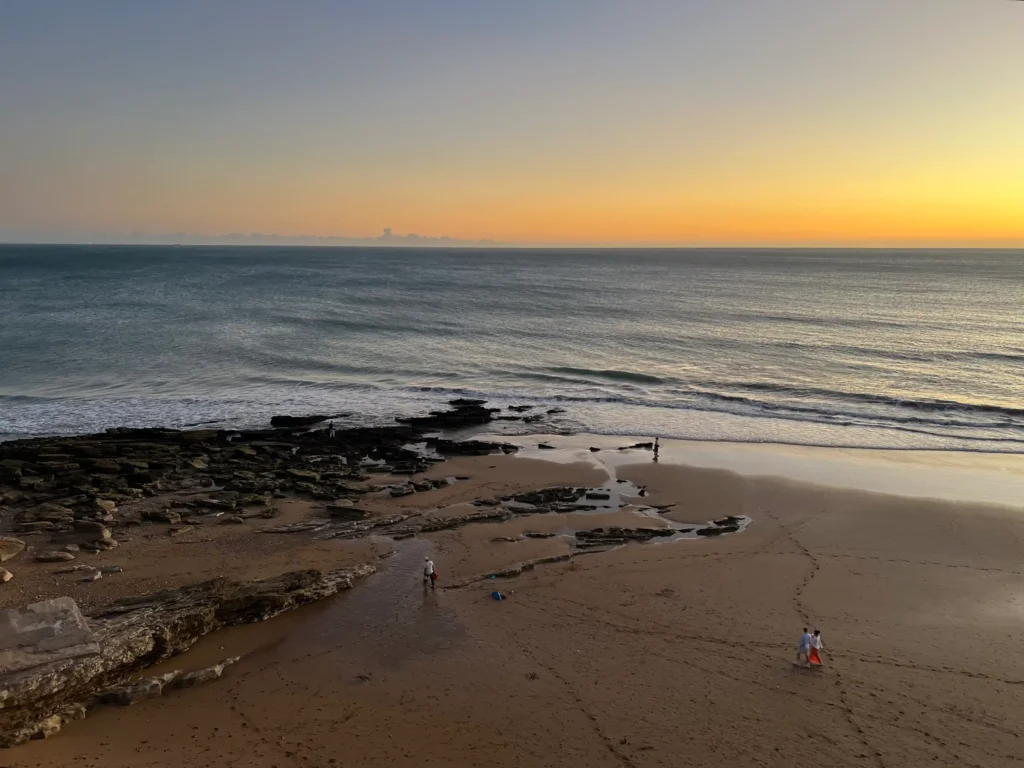 Taghazout beach in Morocco at sunset.